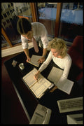 673090 Executives Conferring A4 Photo Print