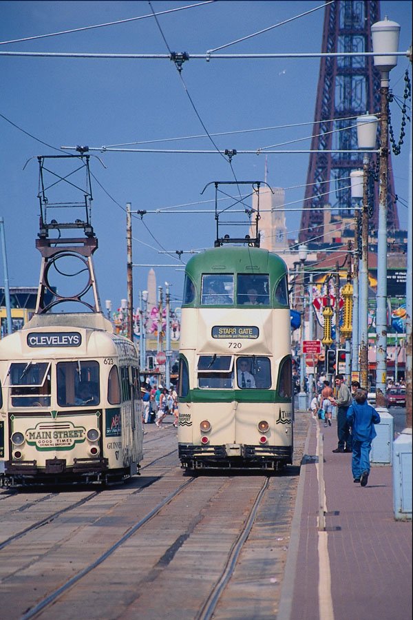 673097 Blackpool Trams With Distant Tower A4 Photo Print