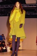 674042 Female In Knee length Coat With Yellow Scarf A4 Photo Print