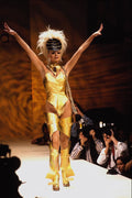 674046 Female Wearing Gold Gladiatorial Effect Outfit A4 Photo Print