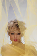 674084 Portrait Of A Girl Looking Through A Yellow Net A4 Photo Print