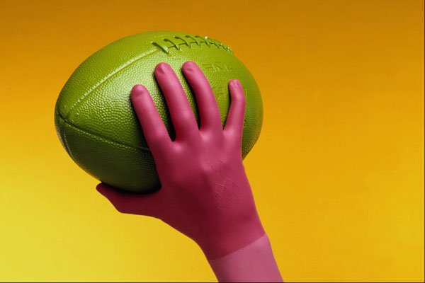 675041 Magenta Gloved Hand And Green Football A4 Photo Print