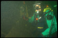 675057 Two Dry Suit Divers Take A Break, Parry Sound, Ontario A4 Photo Print