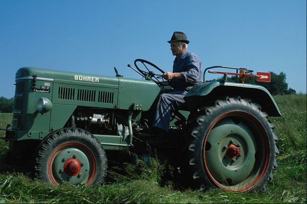 676085 Tractor And Driver, Biel, Canton Bern, Switzerland A4 Photo Print