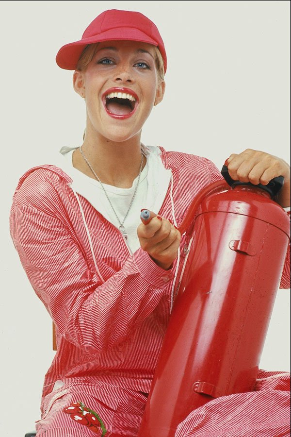 678077 Girl with fire extinguisher A4 Photo Print