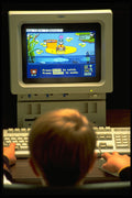 682005 Child Using Computer A4 Photo Print