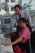 682025 Female Student And Male Teacher In Computer Studies A4 Photo Print