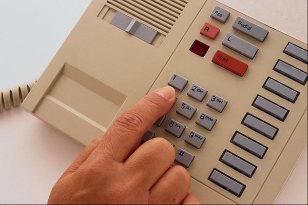 682082 Close up, Hand Dialing Multi line Telephone A4 Photo Print