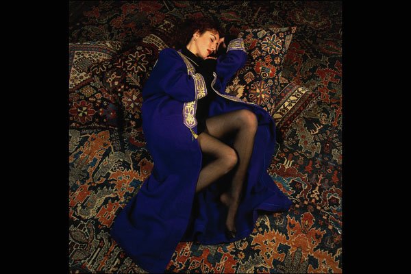 685078 Middle Eastern Beauty Wearing Abaya, Sleeping On Oriental Rugs A4 Photo Print