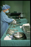686011 Operating Room Nurse Preparing For Surgery A4 Photo Print