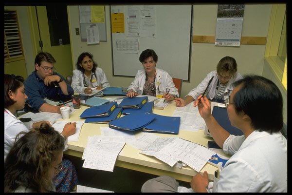 686024 Interns At Work A4 Photo Print