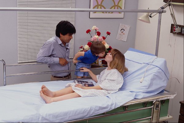 686054 Father And Son Visiting Mother In Hospital A4 Photo Print