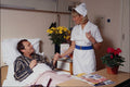 686086 Nurse Checking Male Patient's Pulse A4 Photo Print