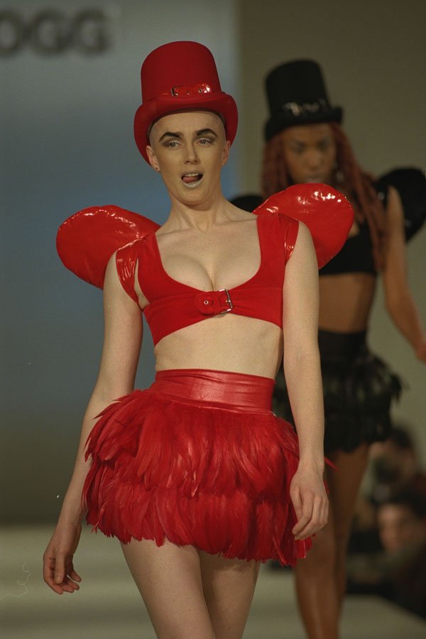 688010 Woman In Red Top Hat, Rubberized Bikini Top And Miniskirt A4 Photo Print