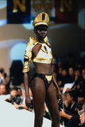688051 Female Wearing Gold Hat And Top With Leather Bikini A4 Photo Print