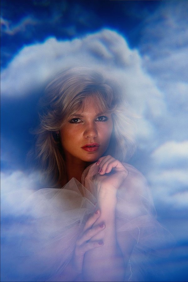 688064 Girl's Face In The Clouds A4 Photo Print