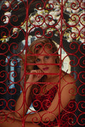 688091 Girl Behind Red Gate A4 Photo Print