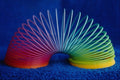 689090 Rainbow colored Slinky Toy A4 Photo Print