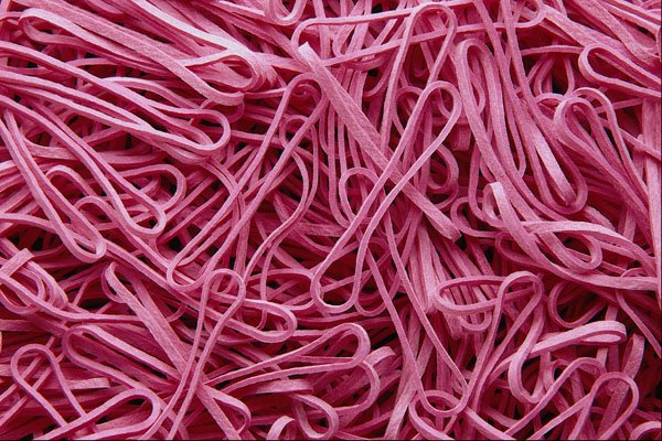 689091 Background Of Red Rubber Bands A4 Photo Print