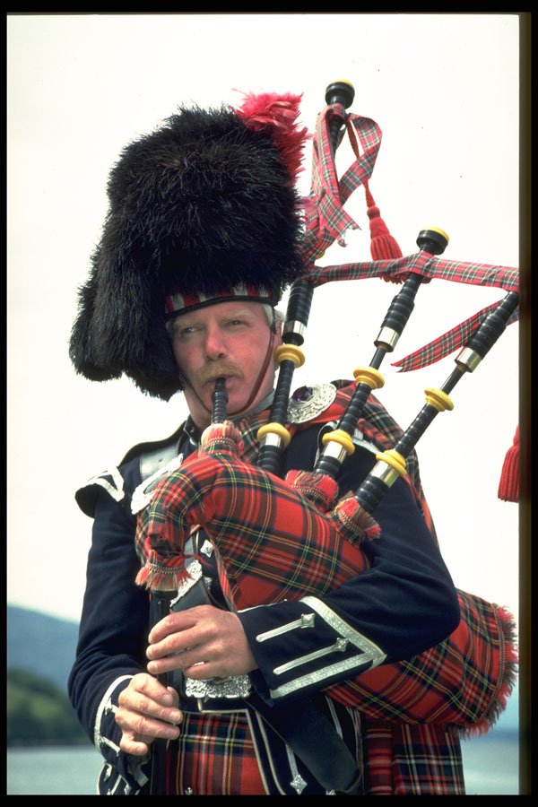 691000 Highland Piper, Western Scotland A4 Photo Print
