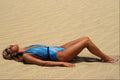 695028 Girl Sunbathing On Beach, Canary Islands A4 Photo Print