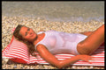 695083 Girl, Pebble Beach, Greece A4 Photo Print