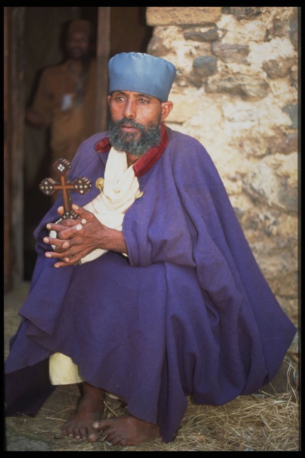 696034 Priest Sitting, Daga Estiphanos A4 Photo Print