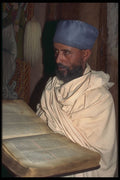 696036 Priest With Ancient Text At Daga Estiphanos A4 Photo Print
