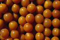 699000 Orange Beads On Strings A4 Photo Print