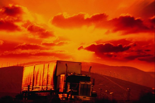 699013 Semi truck And Sunset, California A4 Photo Print