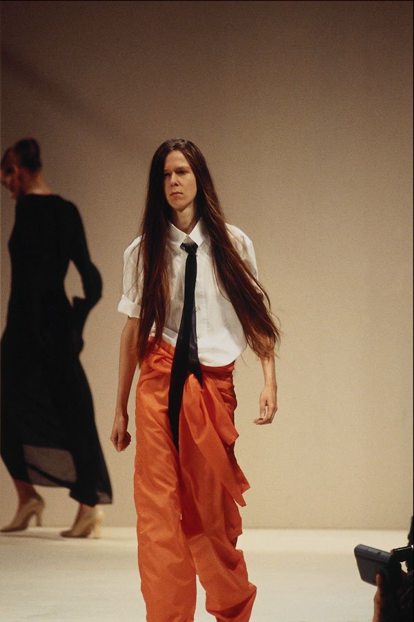 701001 Alexander McQueen, Orange Baggy Trousers A4 Photo Print