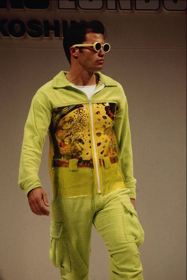 701004 Michiko Koshino, Green And Yellow Plastic Jump Suit A4 Photo Print