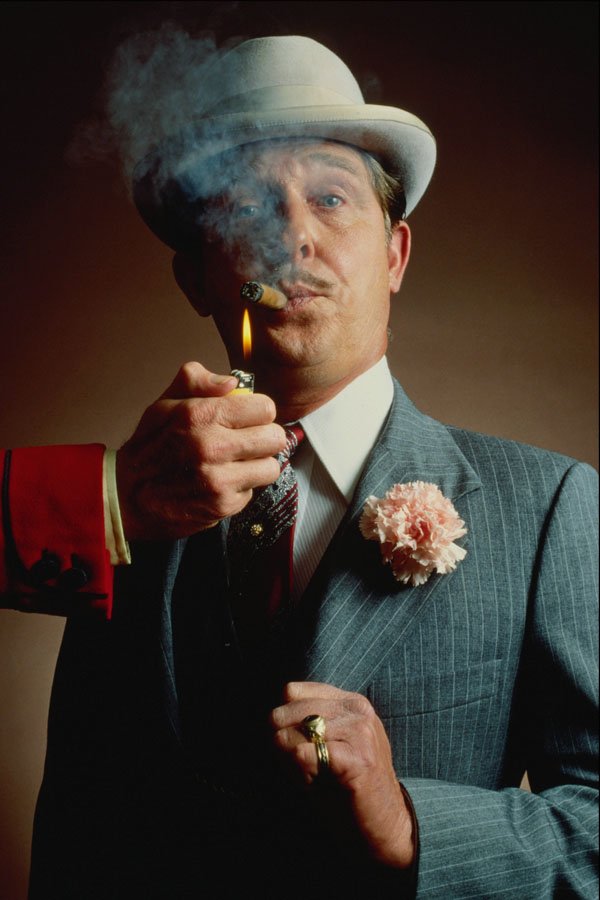 701090 Dignified Man Lighting A Cigar A4 Photo Print