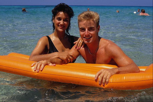 702025 Couple On Air Mattress In Sea, Ibiza, Spain A4 Photo Print