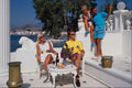 702039 Two Couples On Veranda, Bodrum, Turkey A4 Photo Print
