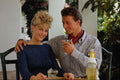 702060 Caroline And Mark Drinking Champagne On Villa Patio A4 Photo Print