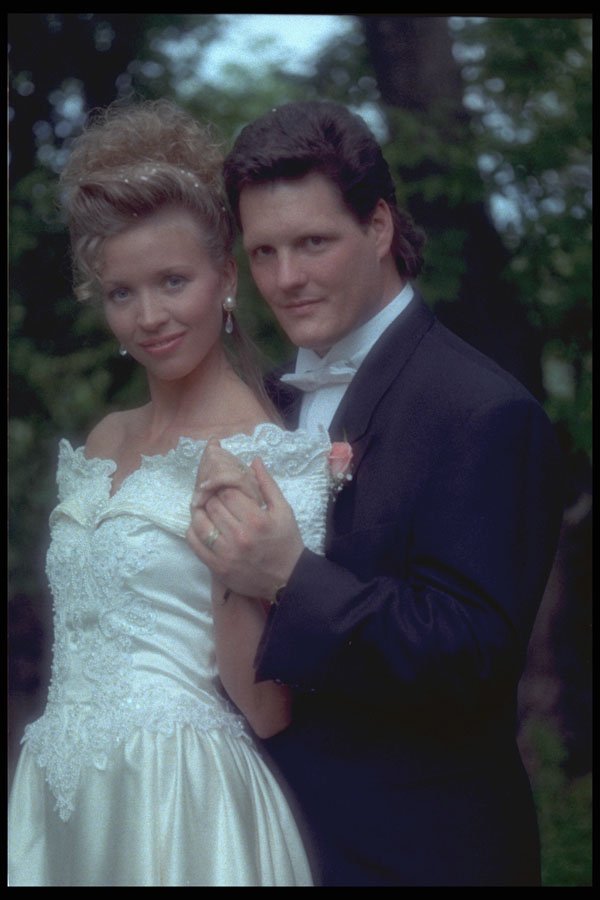 702083 Bride And Groom In A Romantic Embrace A4 Photo Print