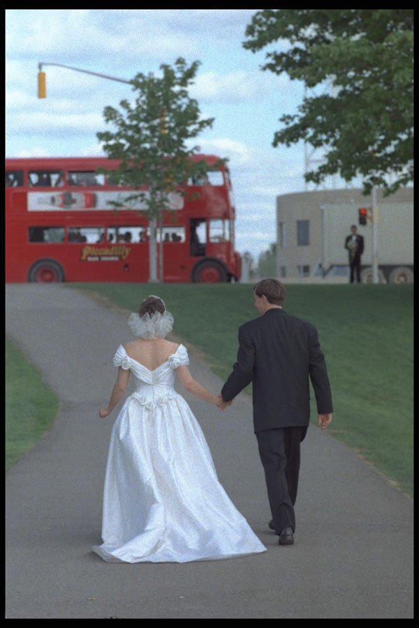 702087 Bride And Groom Walking To A Double Decker Bus A4 Photo Print