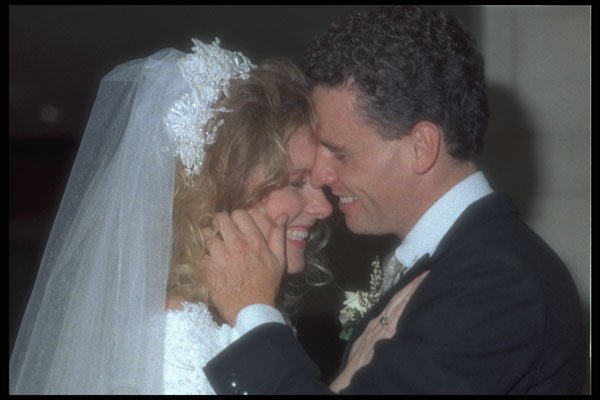 702097 Close up Of Groom Holding Bride's Face A4 Photo Print
