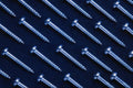 703057 Rows Of Metal Screws A4 Photo Print