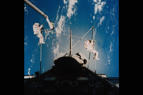 706093 Astronauts In Space, Courtesy NASA A4 Photo Print