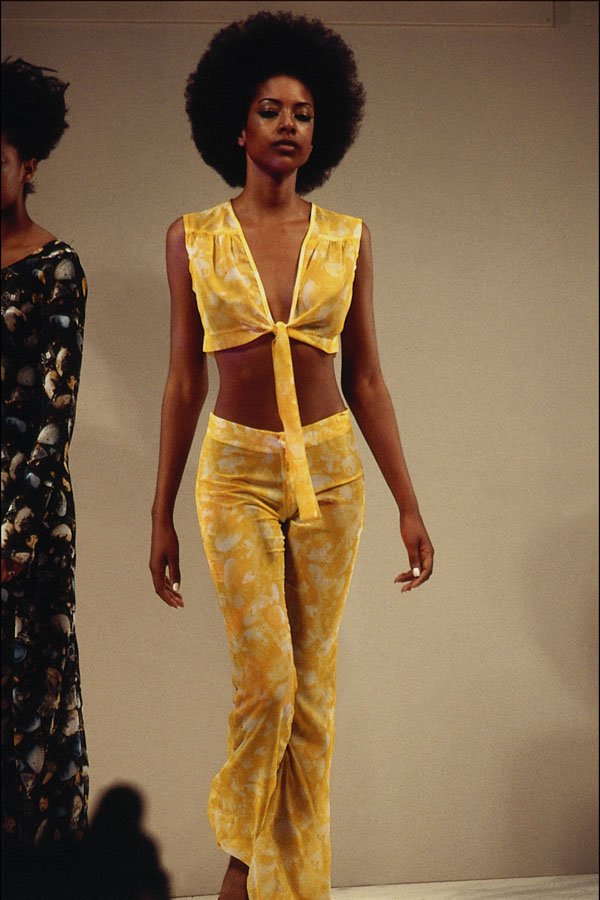 709046 Yellow Top And Hipster Trousers A4 Photo Print
