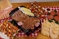710059 Barbecue With Cooked And Uncooked Meats A4 Photo Print