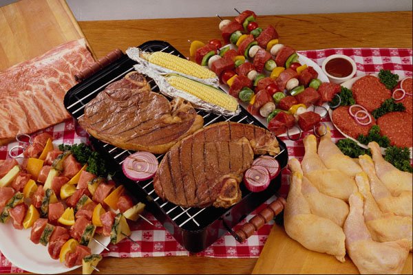 710059 Barbecue With Cooked And Uncooked Meats A4 Photo Print