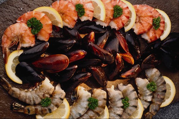 710067 Fresh Cooked And Uncooked Tiger Shrimp With Mussels And Lemon A4 Photo Print