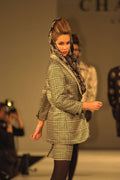 712041 Profile Of A Woman In Gray Patterned Short Suit A4 Photo Print