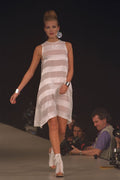 712054 Woman In Knee Length White Sleeveless Dress With White Boots A4 Photo Print