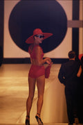 712064 Woman Wearing Orange Bikini And Large Straw Hat A4 Photo Print