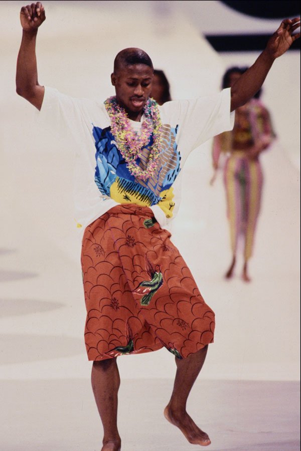 712068 Man In T shirt With Garland And Orange Wraparound Shirt A4 Photo Print