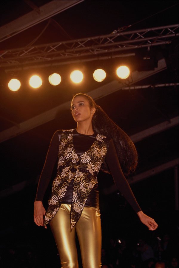 712069 Woman In Dark Top, Patterned Waistcoat And Leggings A4 Photo Print